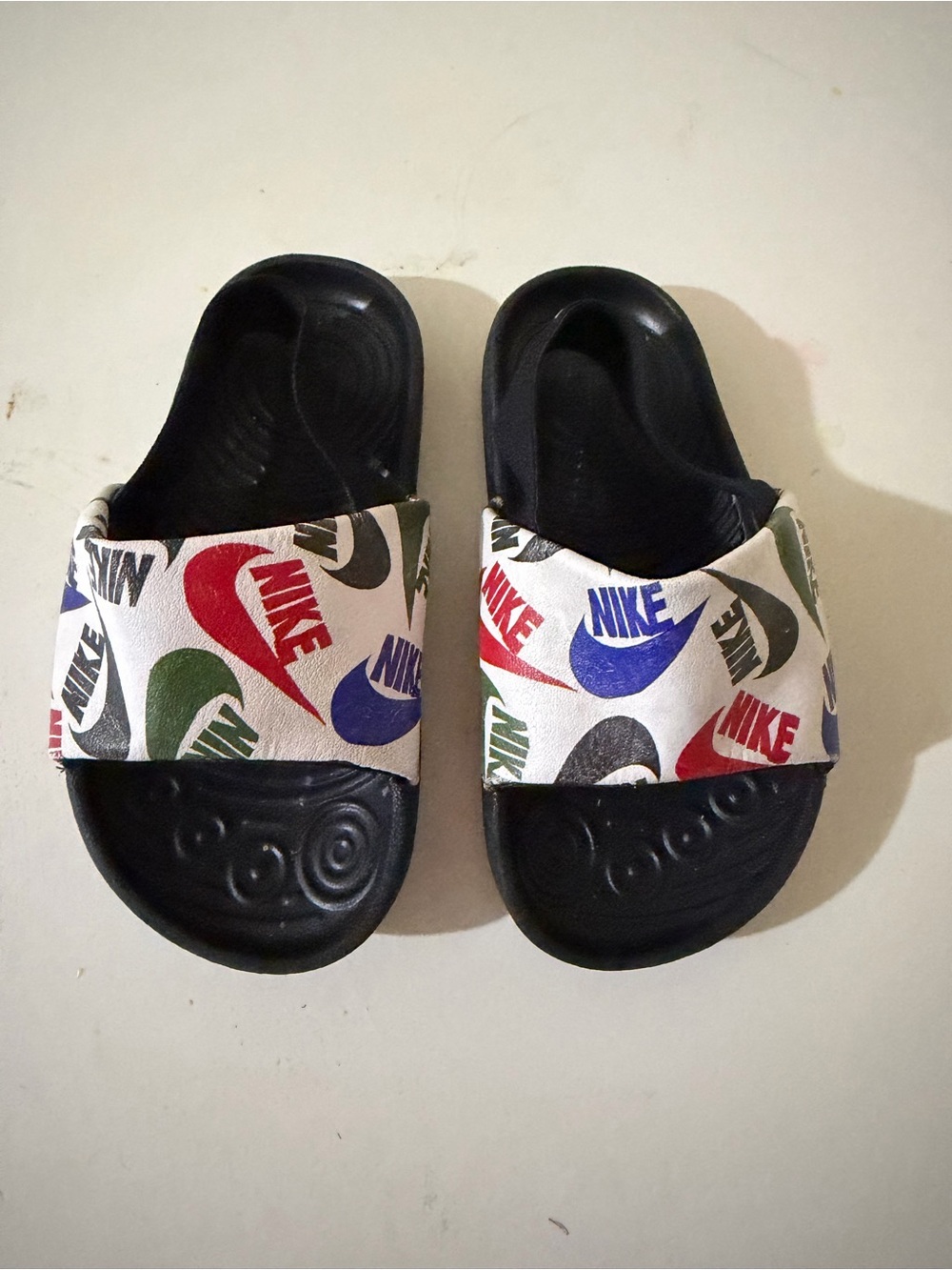 Nike Kids Black Slide Sandals with Multicolor Logo Strap
